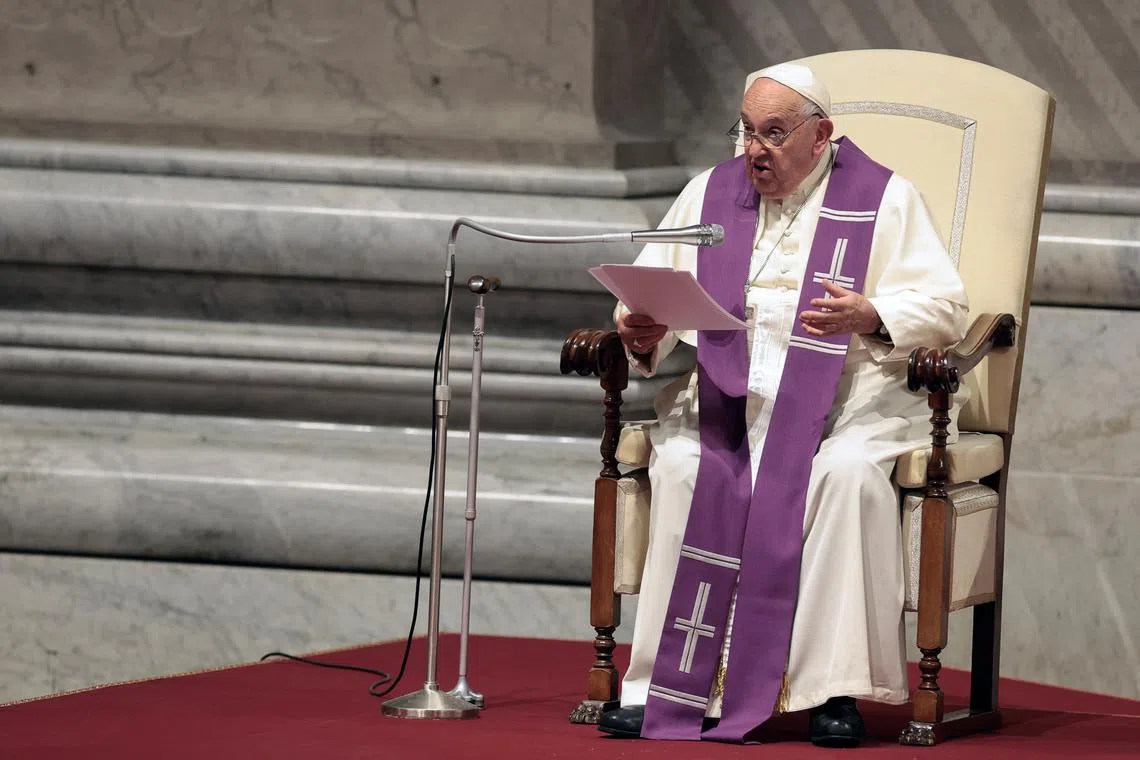 Pope Francis presides over a vigil, ahead of the Synod of bishops, at Saint Peter's church at the Vatican, October 1, 2024. REUTERS/Remo Casilli