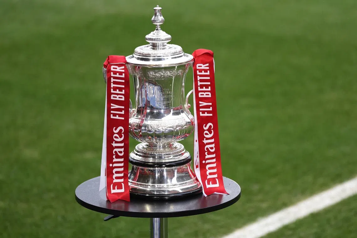 FILE PHOTO: Soccer Football - FA Cup - Fourth Round - Leyton Orient v Manchester City - Brisbane Road, London, Britain - February 8, 2025 General view of the FA Cup trophy on display inside the stadium before the match REUTERS/David Klein/File Photo