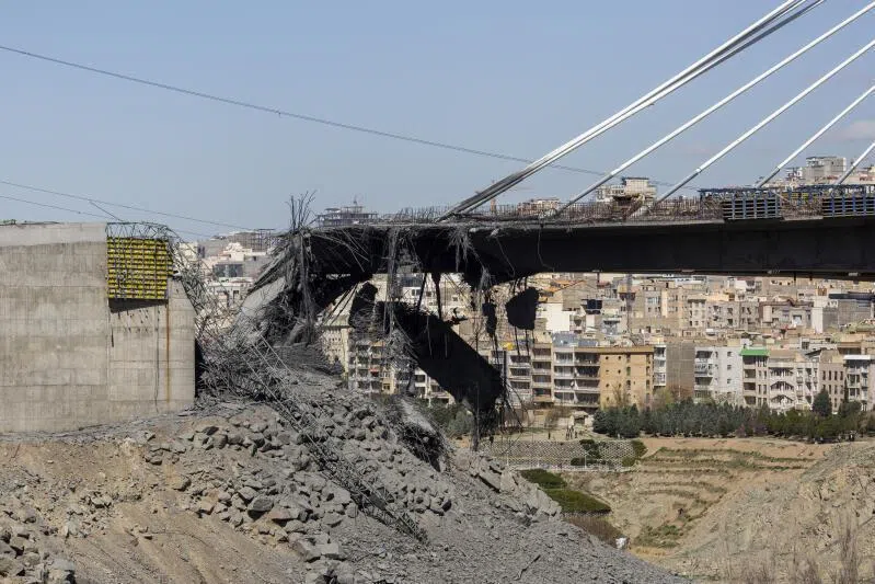 A damaged highway bridge in Karaj, Iran, after a strike near Tehran, on April 3, 2026.