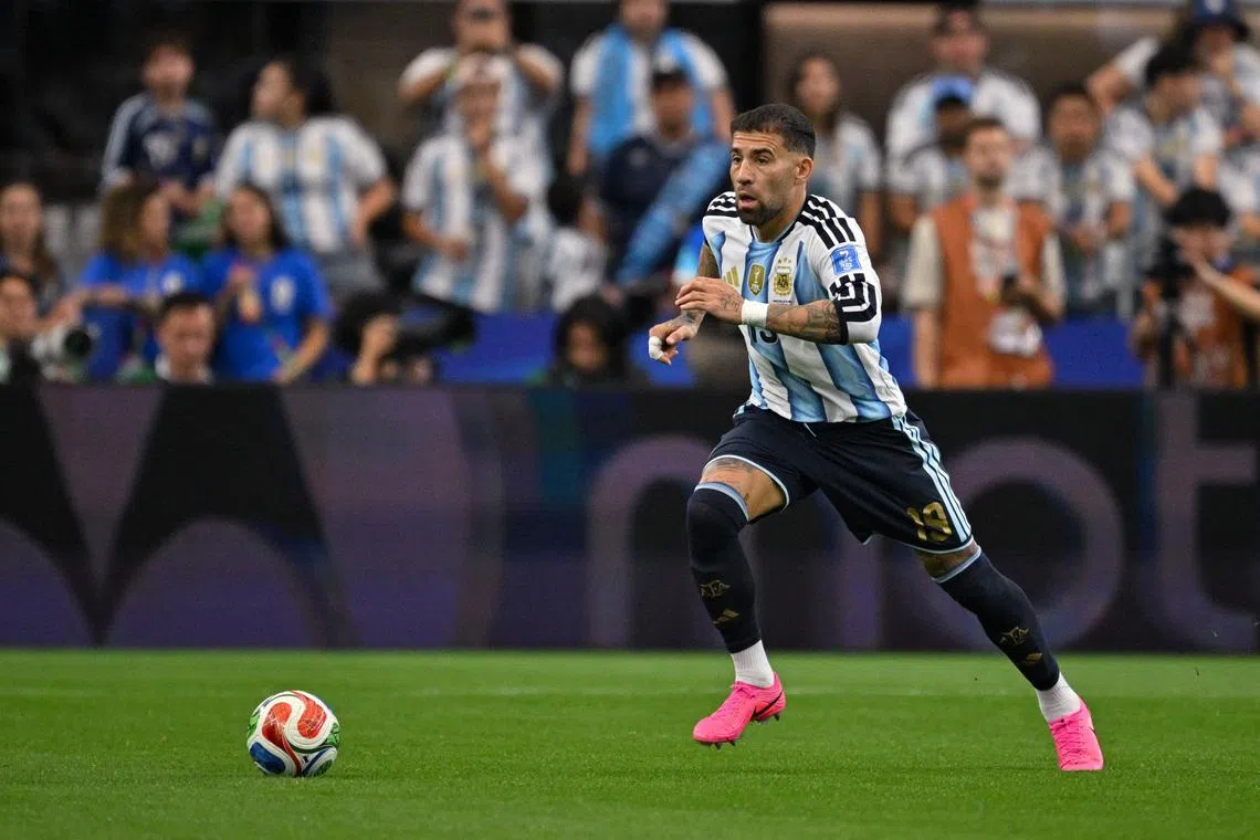 Jun 22, 2026; Arlington, Texas, USA; Argentina defender Cristian Romero (13) in action during a Group J match between Argentina and Austria in the 2026 FIFA World Cup at Dallas Stadium. Mandatory Credit: Jerome Miron-Imagn Images