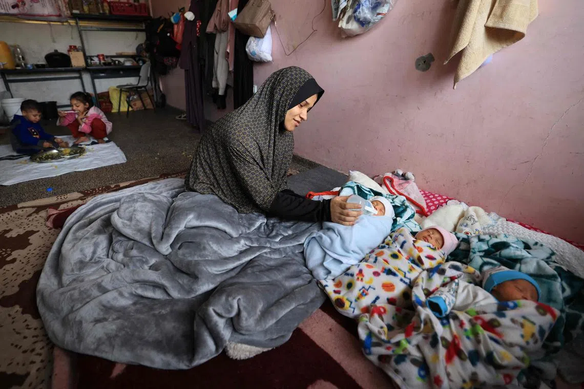 Iman al-Masry gave birth by C-section on Dec 18 to daughters Tia and Lynn and sons Yasser and Mohammed. But she had to leave Mohammed behind at a hospital, as he was born weighing just 1kg.