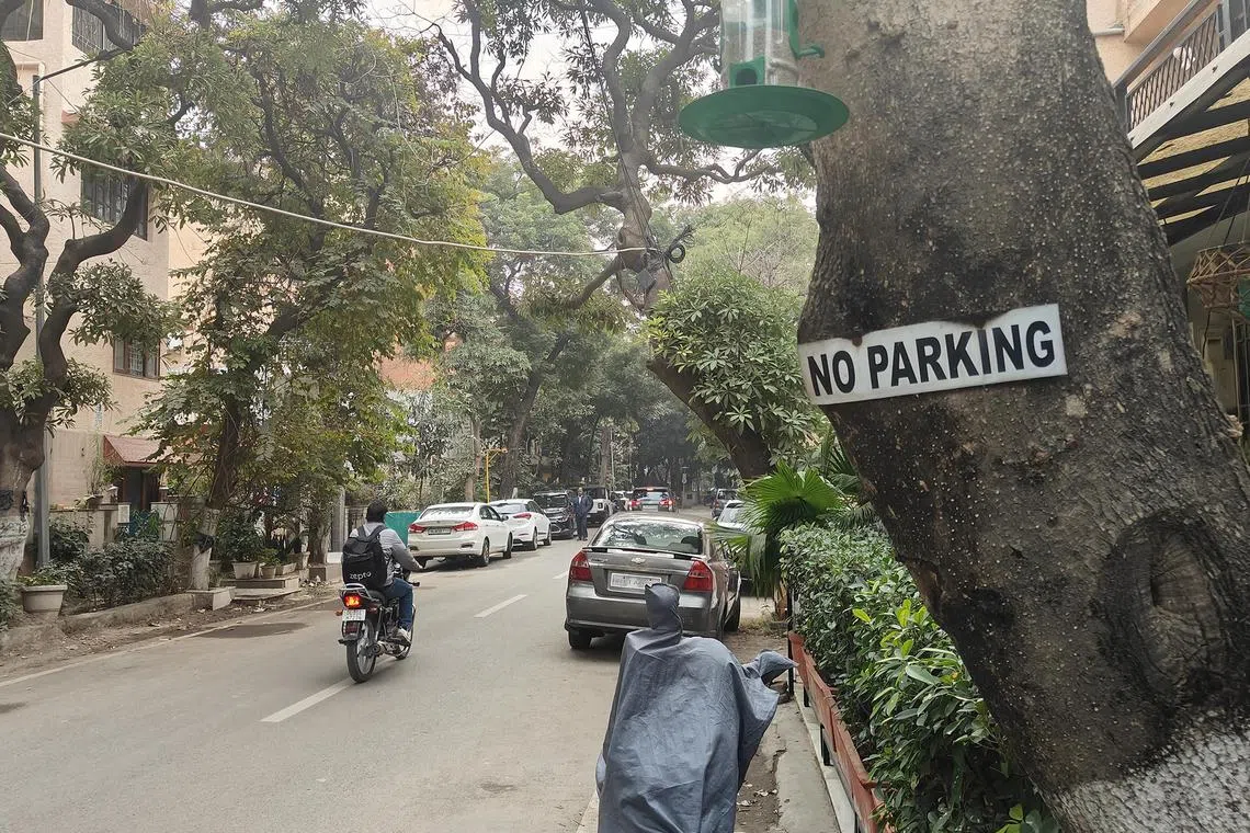 ddparking - A "No Parking" sign in a Delhi residential neighbourhood. As private car ownership surges, the city has seen a spike in parking-related fights. 


ST PHOTO: DEBARSHI DASGUPTA