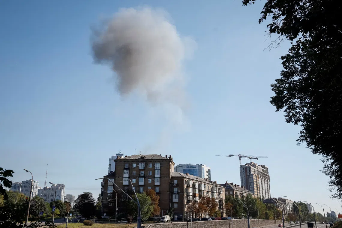 Smoke rises over the headquarters of Kyivstar, one of Ukraine’s largest telecoms companies, hit by a Russian jet drone strike, in Kyiv, on Sept 27.