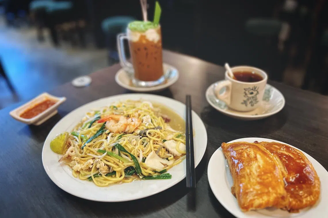 Huai Heong Kopi serves Singapore Prawn Singapore Prawn Mee (which is known as Hokkien Prawn Mee, in the Republic), along with traditional pastries filled with kaya, and coffee concoctions.