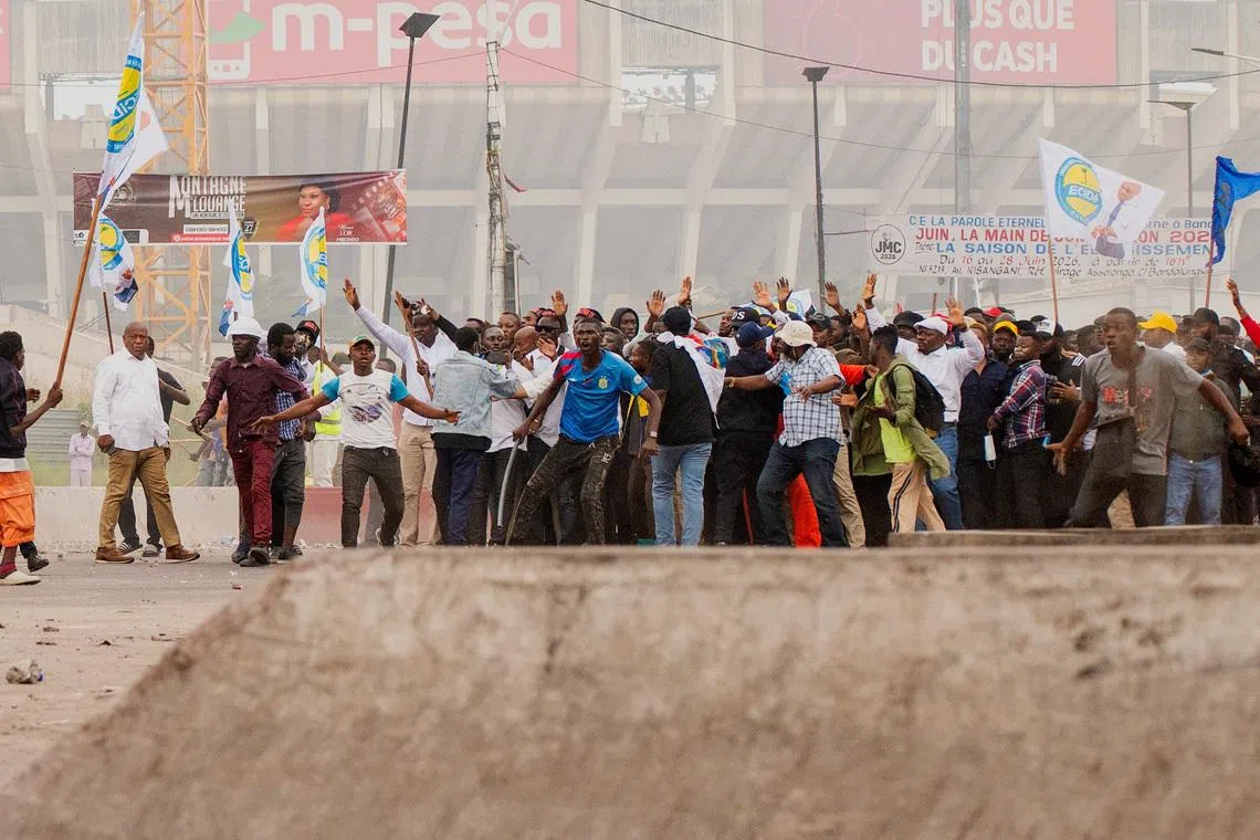 A crowd of protesters gather near the parliament building in Kinshasa, Democratic Republic of Congo, June 12, 2026.    REUTERS/Aristote Lokinda