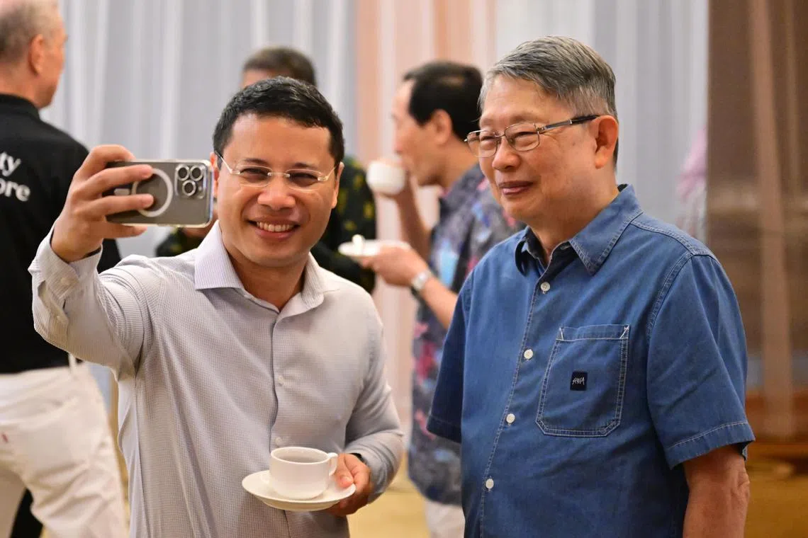 Mr Desmond Lee, Minister for National Development of Singapore, taking a selfie with Professor Chin Tet Young, Emeritus Professor at NUS Law at the Asia-Pacific Centre for Environmental Law (APCEL) Good Stories Movement event at Hotel Jen on July 29. 

ST PHOTO: AZMI ATHNI
