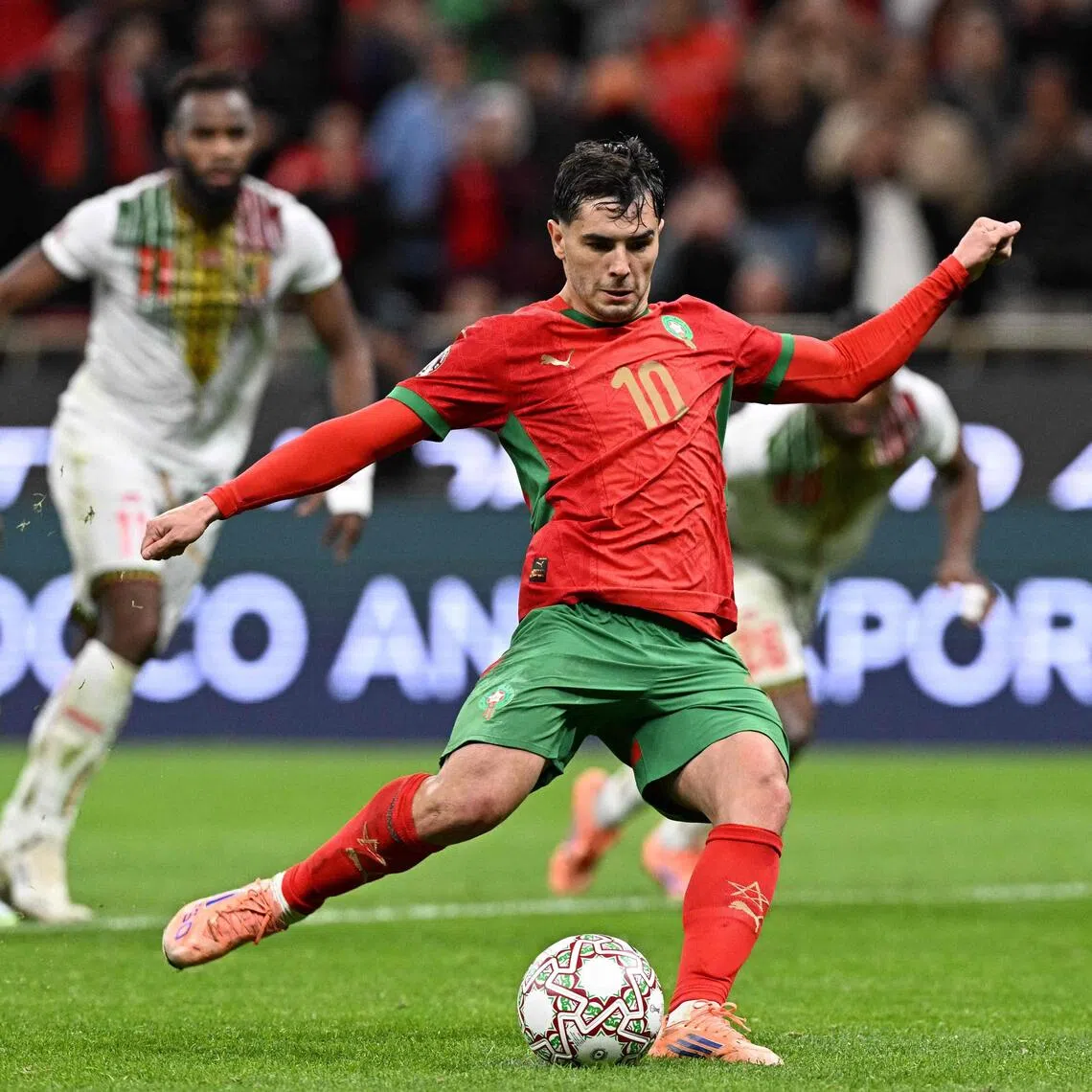Morocco's Brahim Diaz shoots from the penalty spot to score against Mali in the Africa Cup of Nations.