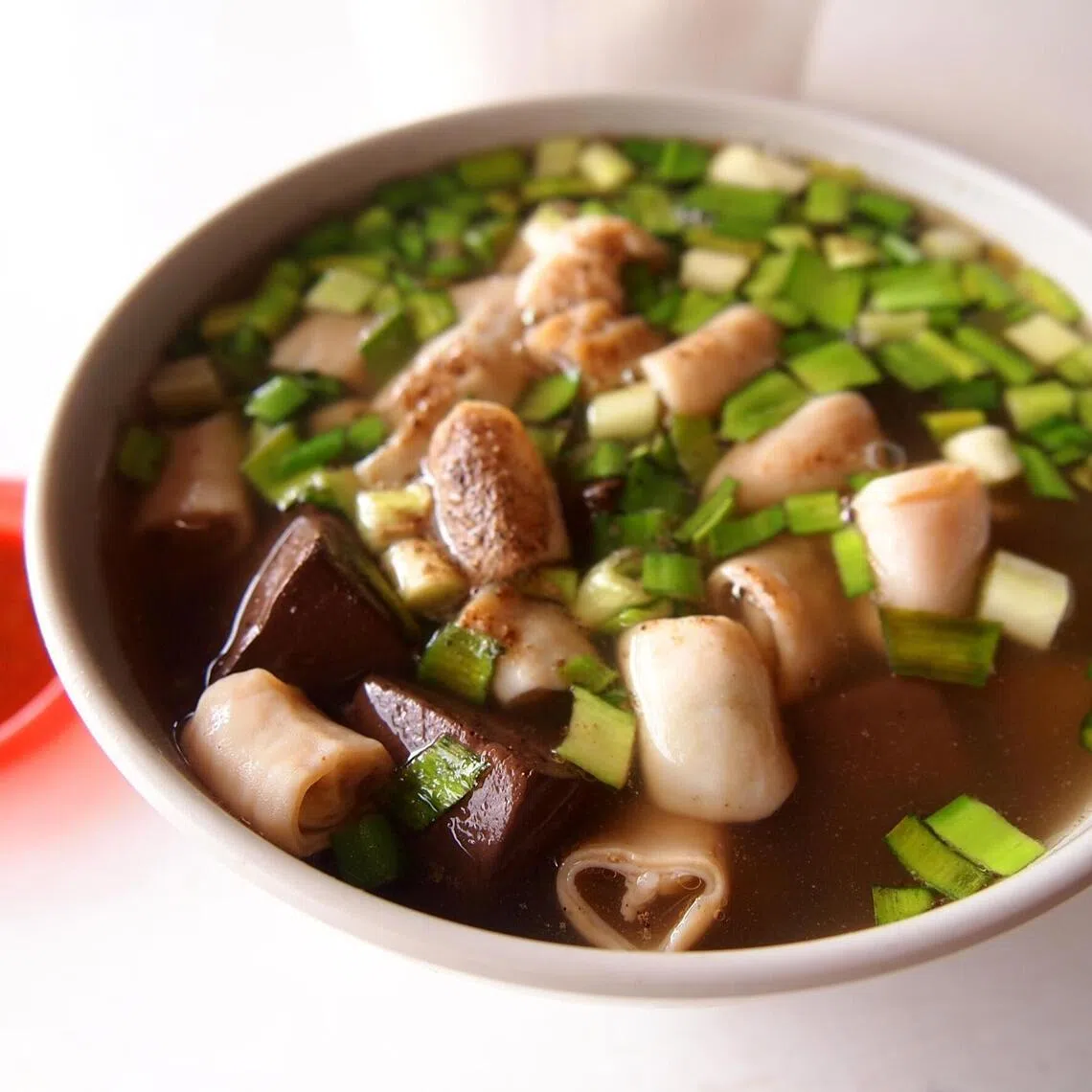 Veteran food critic K.F. Seetoh welcomed the return of pig blood food products, saying it would add to the authenticity of local dishes like Teochew-style pig organ soup, also known as huang kiam chye.