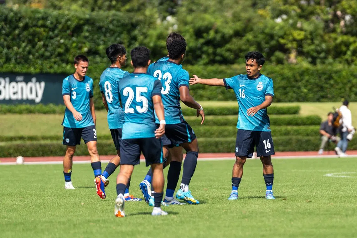 dlmatch11 - Hami Syahin (right) celebrates with his Lions teammates after scoring the opener in the 2-1 friendly win over J1 League's Tokyo Verdy.

credit: Football Association of Singapore
section: Sports
copyright: For SPH use only