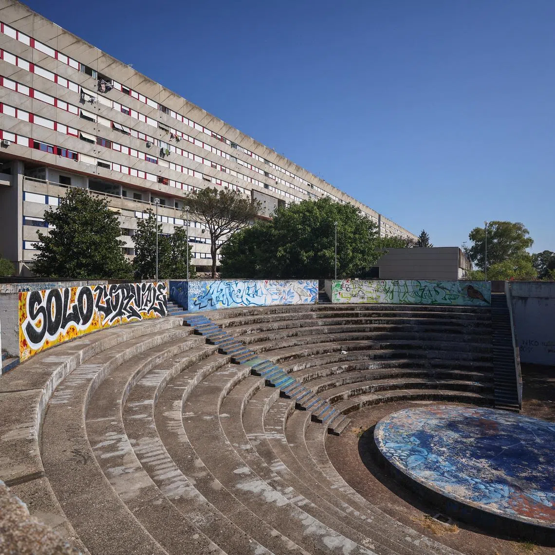 An amphitheatre not included in the current renovation project stands beside Corviale, where a €58 million EU-backed programme is refurbishing other public buildings, green areas and communal spaces to improve climate resilience and social inclusion for about 4,500 residents, in Rome, Italy, June 15, 2026. REUTERS/Vincenzo Livieri