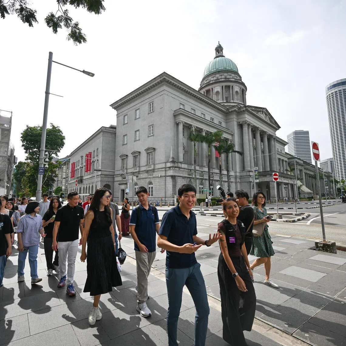 Participants in the heritage trail walking past the National Gallery, formerly the Supreme Court, on July 2.