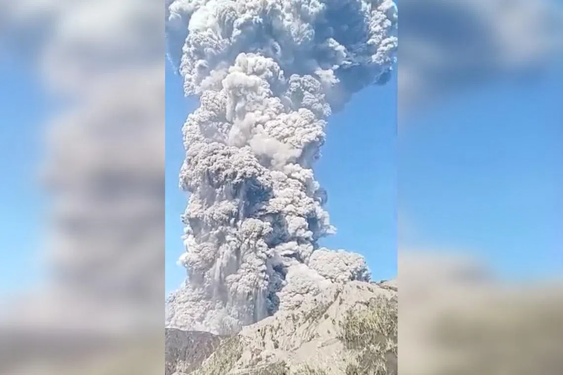 The volcanic eruption of Mount Dukono in North Halmahera Regency, North Maluku, Indonesia on May 8, in this screengrab obtained from a social media video.
