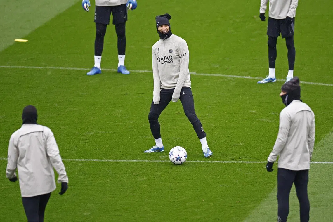 Paris Saint-Germain's Achraf Hakimi with his teammates during training ahead of their Champions League clash against Newcastle United on Nov 28.