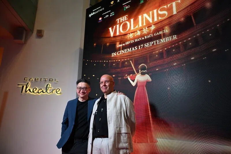 Director Ervin Han with co-director Raul Garcia on the red carpet for the gala premiere of The Violinist at The Capitol Theatre on Sept 3.