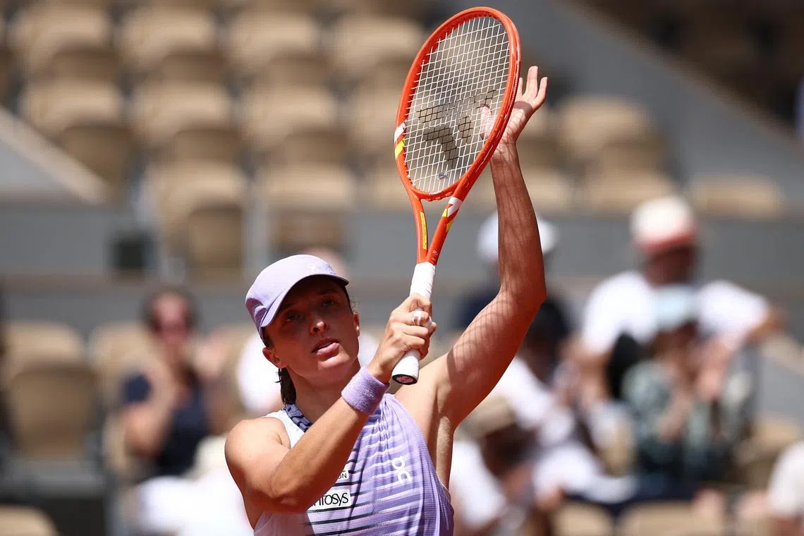 Poland's Iga Swiatek celebrates winning her third round match against Poland's Magda Linette, Tennis, French Open, Roland Garros, Paris, France, May 29, 2026. REUTERS/Guglielmo Mangiapane