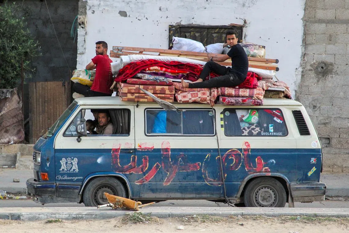 Displaced Palestinians travel in a vehicle as they flee Rafah, after Israeli forces launched a ground and air operation in the eastern part of the southern Gaza city, amid the ongoing conflict between Israel and Hamas, in Rafah, in the southern Gaza Strip May 12, 2024. REUTERS/Hatem Khaled
