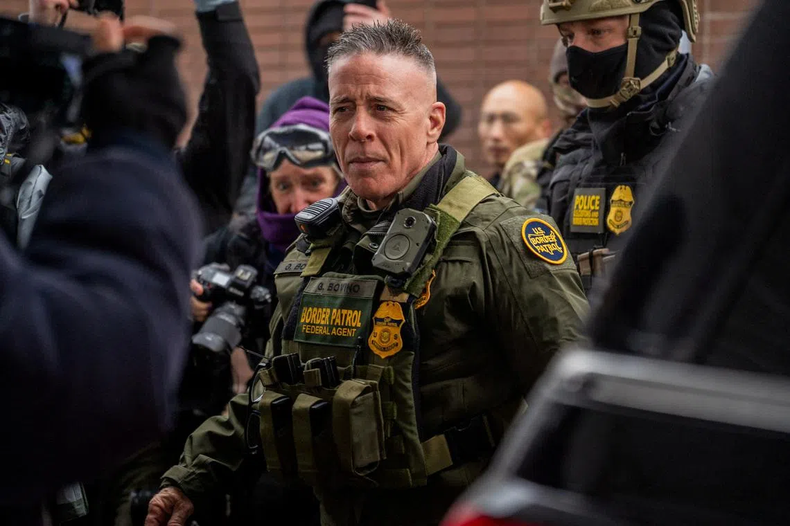 FILE PHOTO: U.S. Border Patrol Chief Gregory Bovino outside a Speedway gas station after his convoy stopped there, where protesters and community observers gathered, in Minneapolis, Minnesota, U.S., January 21, 2026. REUTERS/Madison Swart/File Photo