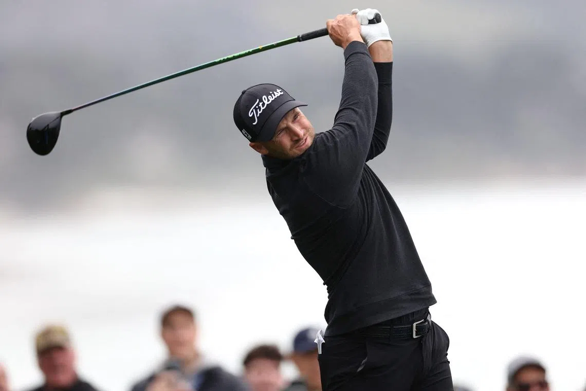 Wyndham Clark of the United States playing his shot from the 14th tee during the Pebble Beach Pro-Am.