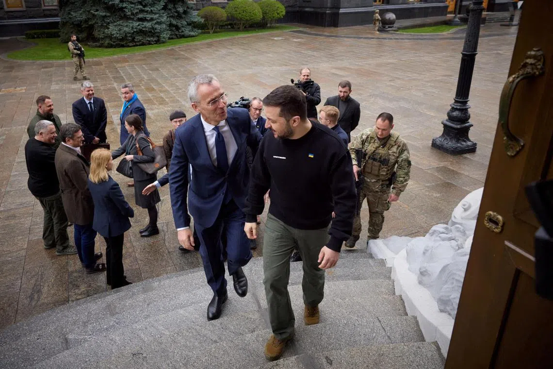Nato Secretary-General Jens Stoltenberg (centre, left) is welcomed to Kyiv in April 2023, by Ukrainian President Volodymyr Zelensky.