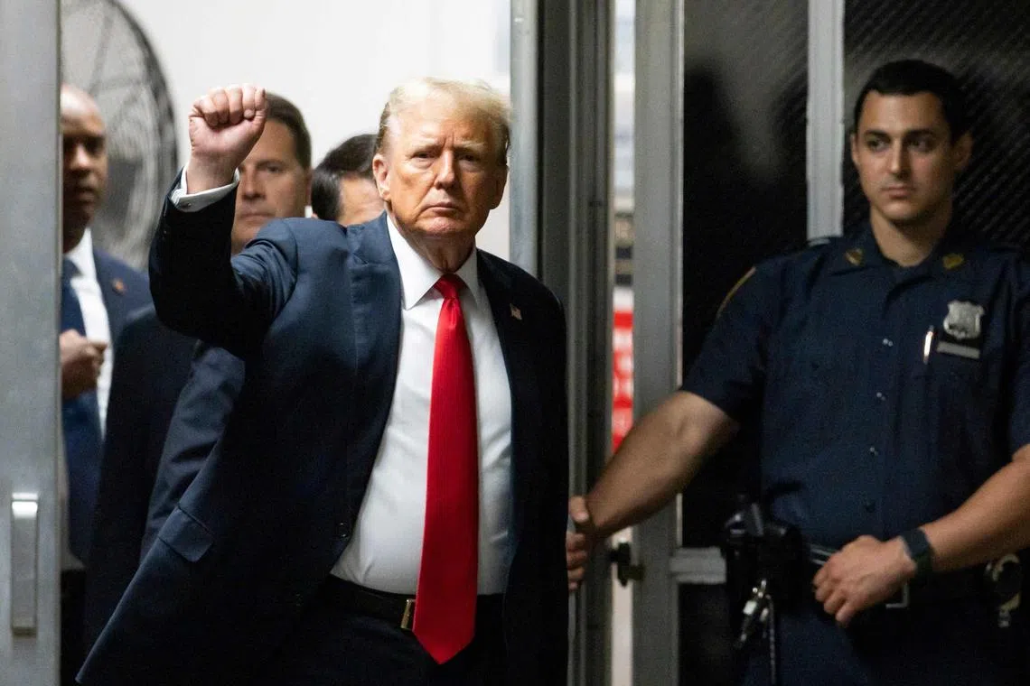 Former US president and Republican presidential candidate Donald Trump returning from a break in his criminal trial, on May 28.