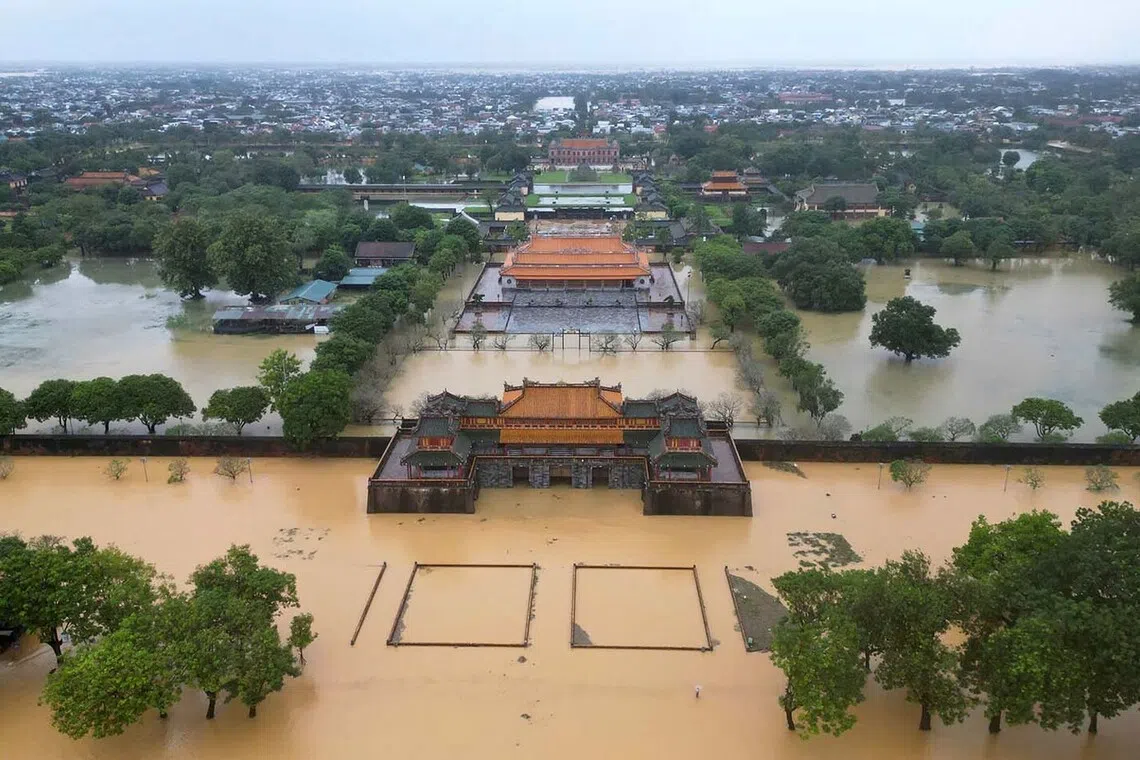 TOPSHOT - An aerial view shows floodwaters inundating Hue Imperial City in Vietnam on Oct 28, 2025. 