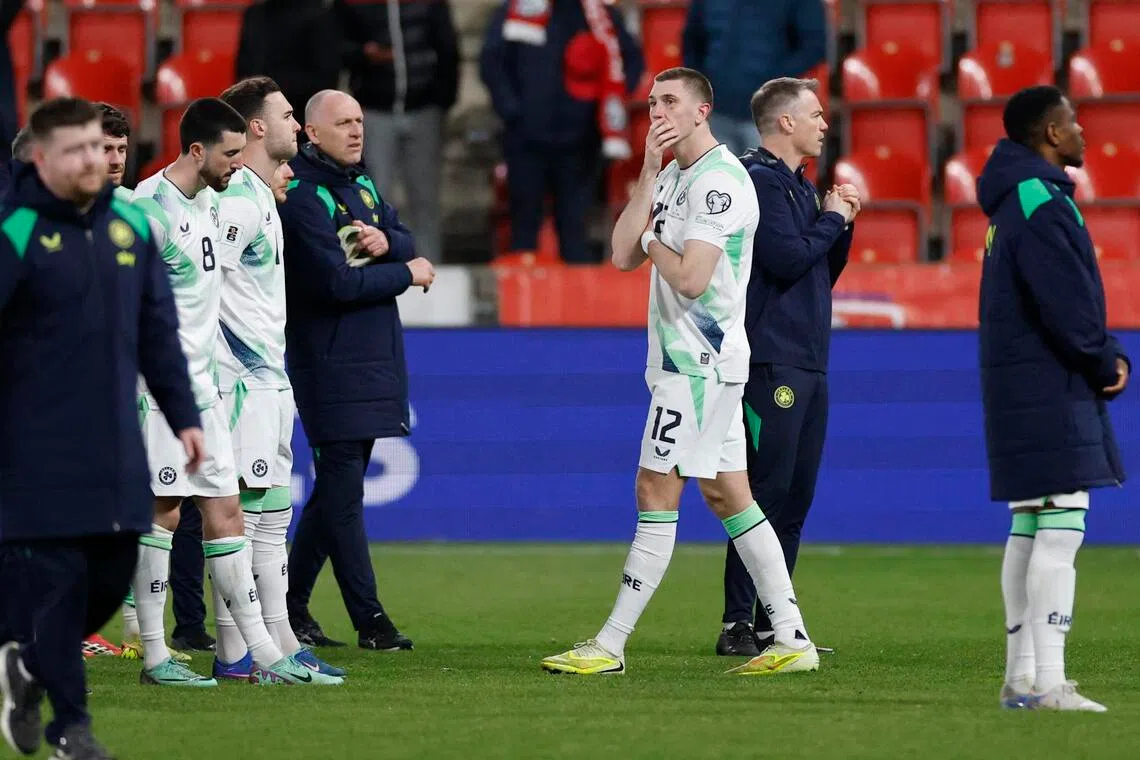 The Republic of Ireland's Jimmy Dunne and teammates look dejected after losing the penalty shoot-out in the World Cup qualifying semi-final against the Czech Republic at Fortuna Arena in Prague on March 26, 2026.
