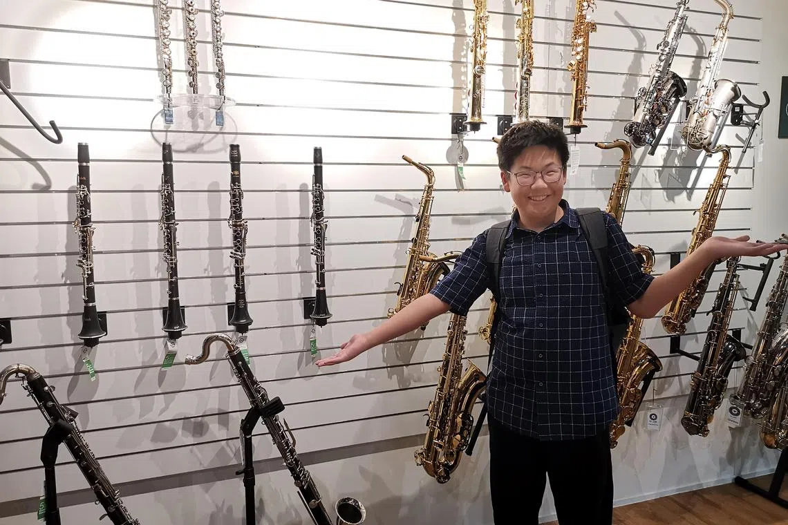lxuniversity19 - Nathanael Koh, who turns 13 on March 20, posing with a wall of instruments at Jeremy Monteiro's music studio. Photo taken in 2022.


Credit: Chris Koh