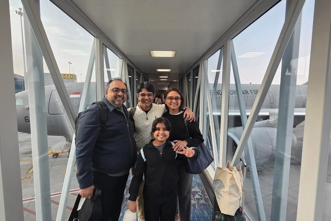 Mr Nisar Keshvani with his wife and children, before boarding the RSAF evacuation flight from Riyadh, Saudi Arabia. 