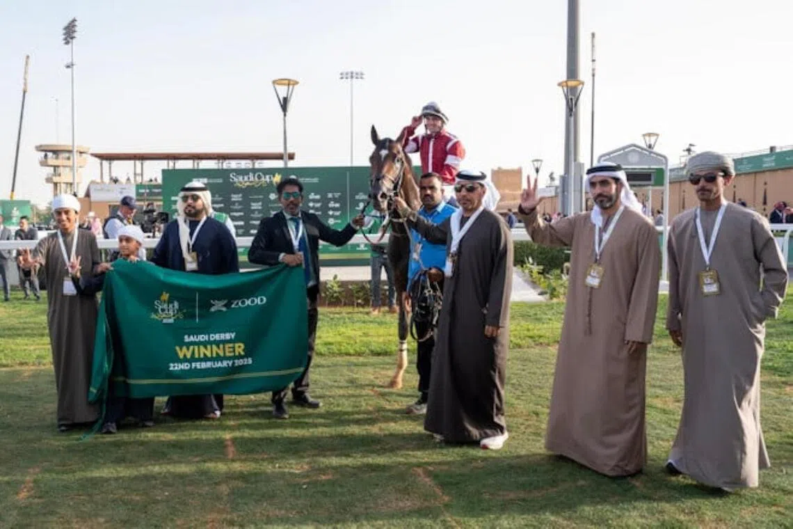 Golden Vekoma (Connor Beasley) led in to the winner's circle at King Abdulaziz racecourse by happy connections after his win in the 2025 Group 3 Saudi Derby (1,600m) on Feb 22. 

Photo: by Jockey Club of Saudi Arabia / Mathea Kelley