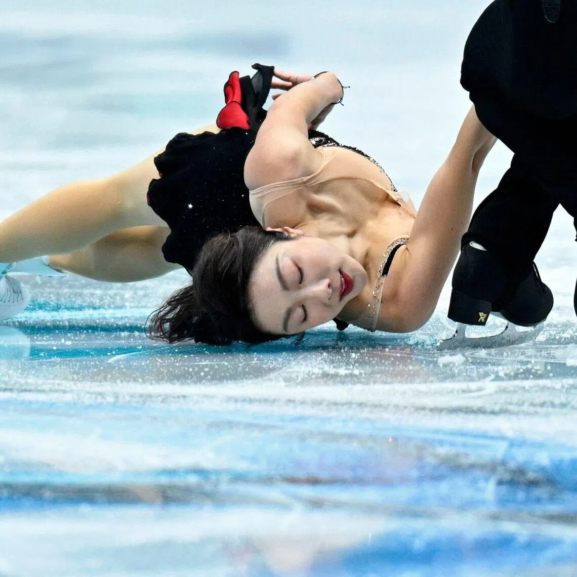 TOPSHOT - Chinas Sui Wenjing (L) and Han Cong performing in the pairs short program during the ISU Figure Skating Four Continents Championships 2026 in Beijing, China on Jan 22, 2026. 