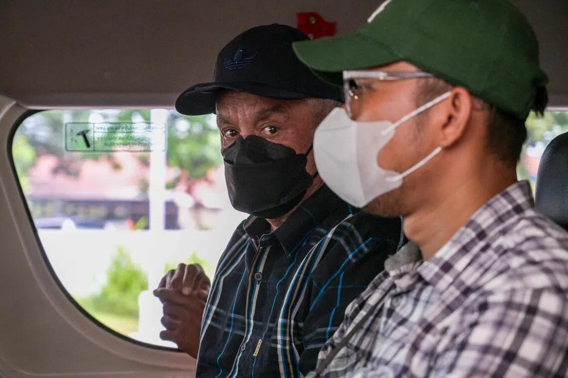 Dutch prisoner Ali Tokman (centre) sits in a car as he leaves the Surabaya Prison in Porong, East Java province on Dec 7, 2025.