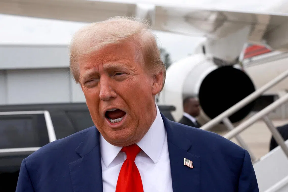 Republican presidential nominee Donald Trump arrives at the Augusta Regional Airport, Georgia, on Oct 4 to visit areas damaged during Hurricane Helene.