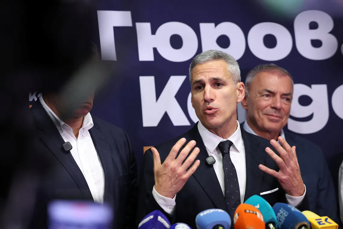 Presidential candidate Andrey Gyurov speaks to the media after exit polls are published during the presidential election, in Sofia, Bulgaria, October 25, 2026. REUTERS/Spasiyana Sergieva