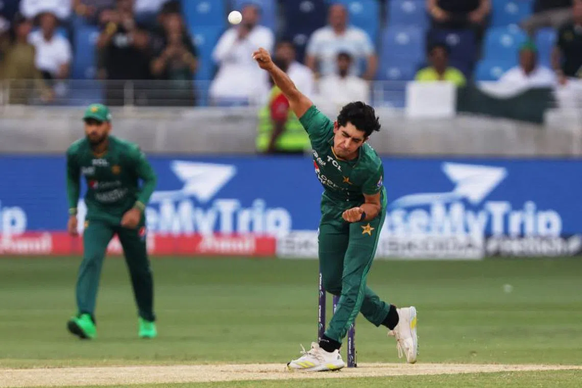 FILE PHOTO:Cricket - Asia Cup - Final - Pakistan v Sri Lanka - Dubai International Stadium, Dubai, United Arab Emirates - September 11, 2022 Pakistan's Naseem Shah in action REUTERS/Christopher Pike/File Photo