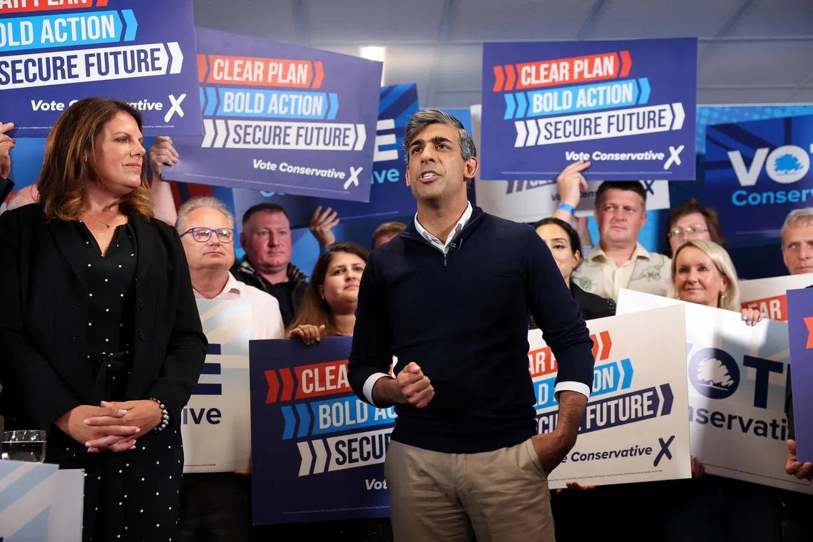 British Prime Minister Rishi Sunak gestures during his final rally at Romsey Rugby Football Club as part of a Conservative general election campaign event in Hampshire, Britain July 3, 2024. REUTERS/Claudia Greco