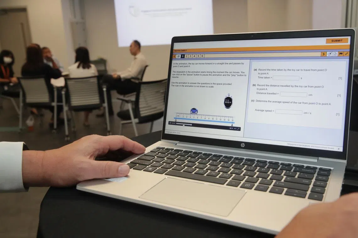 Journalist Elisha Tushara (in black top) attends a demo session in June by SEAB (Singapore Examinations and Assessment Board), where they simulated the conduct of e-exams.