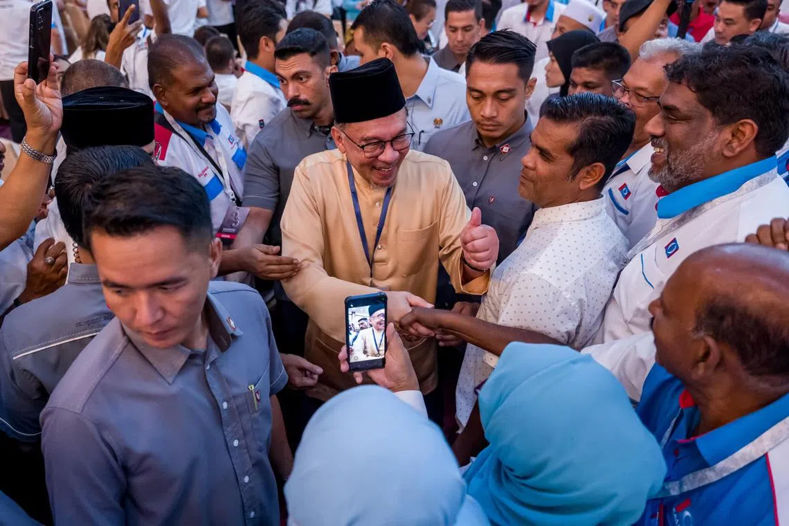 Malaysian PM Anwar Ibrahim brushed aside criticism that he has compromised his reform agenda.
