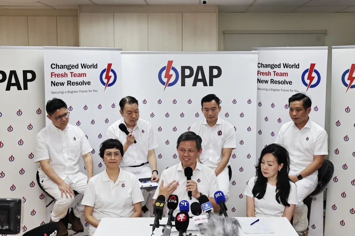 Education Minister Chan Chun Sing (centre) said that political service is also not a once-in-five-year exercise, but a daily effort to listen to residents.