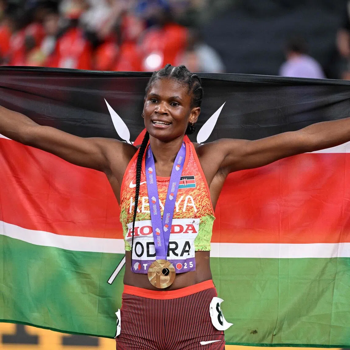 Lilian Odira celebrates after winning the women's 800m final.