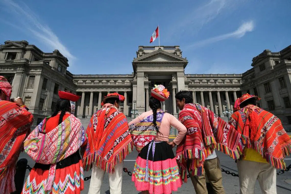 FILE PHOTO: Members of a delegation from Ollantaytambo stand outside the court of justice before joining the protests against Peru's President Dina Boluarte, in Lima, Peru January 26, 2023. REUTERS/Liz Tasa/File Photo