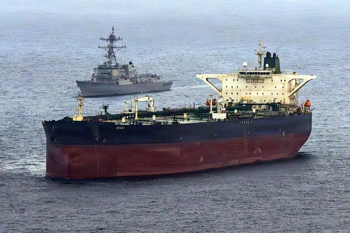 The Arleigh Burke-class destroyer USS Rafael Peralta intercepts the Iran-flagged oil tanker Herby.