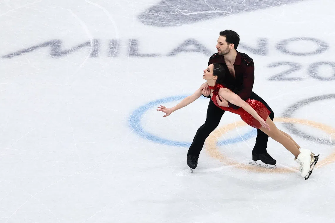 Milano Cortina 2026 Olympics - Figure Skating - Pair Skating - Free Skating - Milano Ice Skating Arena, Milan, Italy - February 16, 2026. Deanna Stellato-Dudek of Canada and Maxime Deschamps of Canada perform during the Free Skating REUTERS/Amanda Perobelli