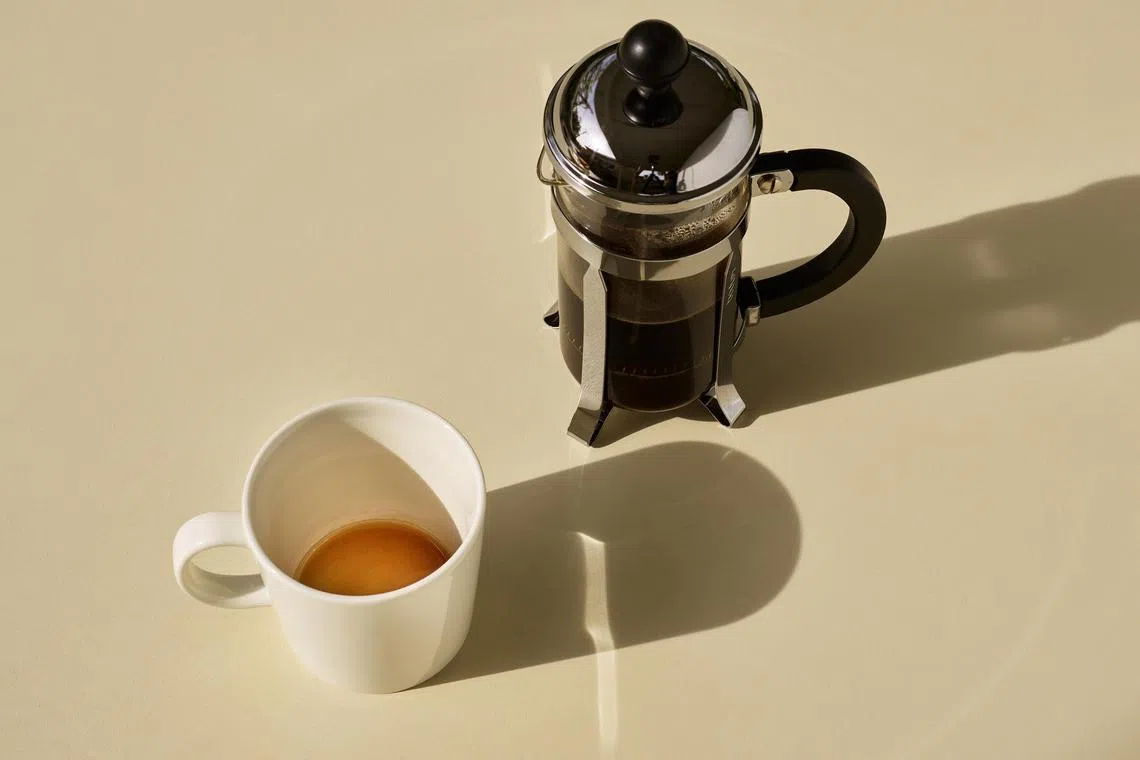 A French press and coffee mug in Palm Springs, California, on Jan 14, 2023. For many people, enjoying a freshly brewed cup of coffee first thing in the morning is a non-negotiable way to start the day.