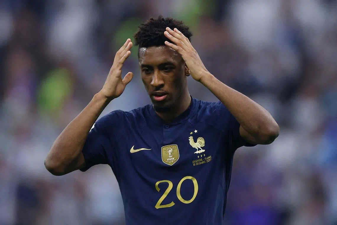France's Kingsley Coman looks dejected after missing a penalty during the penalty shootout.