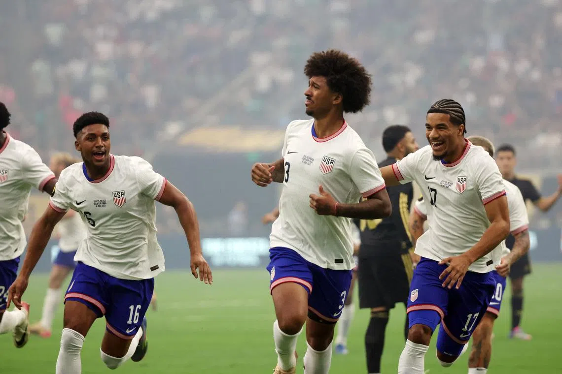 Jul 6, 2025; Houston, Texas, USA; United States defender Chris Richards (3) celebrates with teammates after scoring a goal against the Mexico during the 2025 Gold Cup Final at NRG Stadium. Mandatory Credit: Thomas Shea-Imagn Images