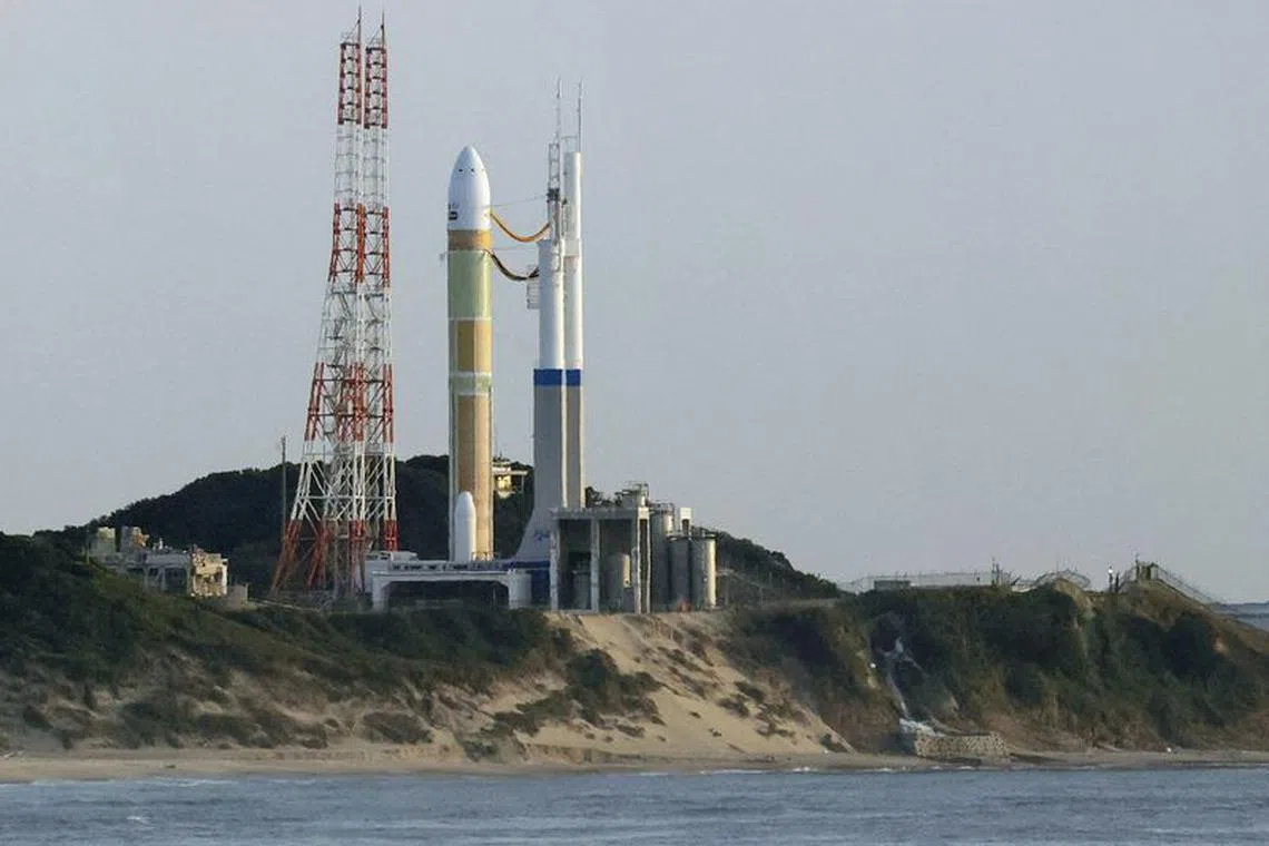 FILE PHOTO: An H3 rocket carrying a land observation satellite is seen before its launch at the Tanegashima Space Center in Kagoshima Prefecture, southwestern Japan February 17, 2023, in this photo taken by Kyodo. Kyodo via REUTERS/File Photo