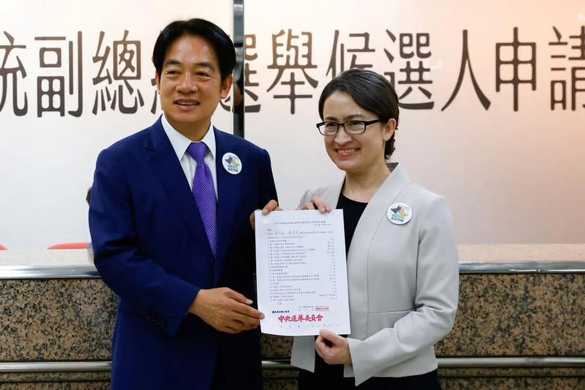 Taiwan's Vice President Lai Ching-te and running mate Hsiao Bi-Khim pose for a photo after registering for the upcoming presidential election at the Central Election Commission in Taipei, Taiwan November 21, 2023. REUTERS/Ann WAng
