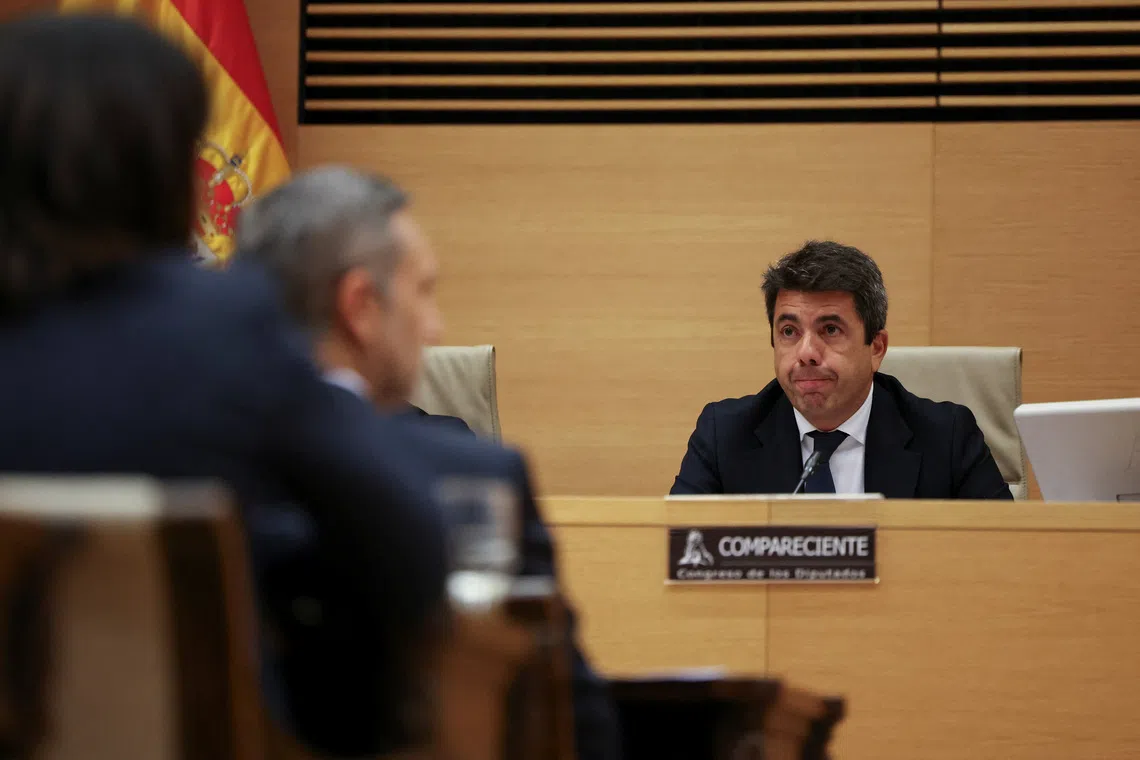 Valencia's acting president Carlos Mazon, who resigned in early November, testifies before a parliamentary commission tasked with investigating the management of the crisis caused by the devastating floods of October 29, 2024, in Madrid, Spain, November 17, 2025. REUTERS/Violeta Santos Moura