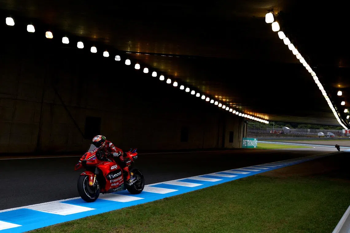FILE PHOTO: MotoGP - Japanese Grand Prix - Mobility Resort Motegi, Motegi, Japan - October 6, 2024 Ducati Lenovo Team's Francesco Bagnaia in action during the MotoGP race REUTERS/Kim Kyung-Hoon/File photo