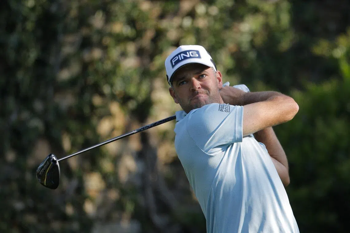 Golf - The Masters - Augusta National Golf Club, Augusta, Georgia, U.S. - April 10, 2025  Canada's Corey Conners hits his tee shot on the 2nd hole during the first round REUTERS/Mike Blake